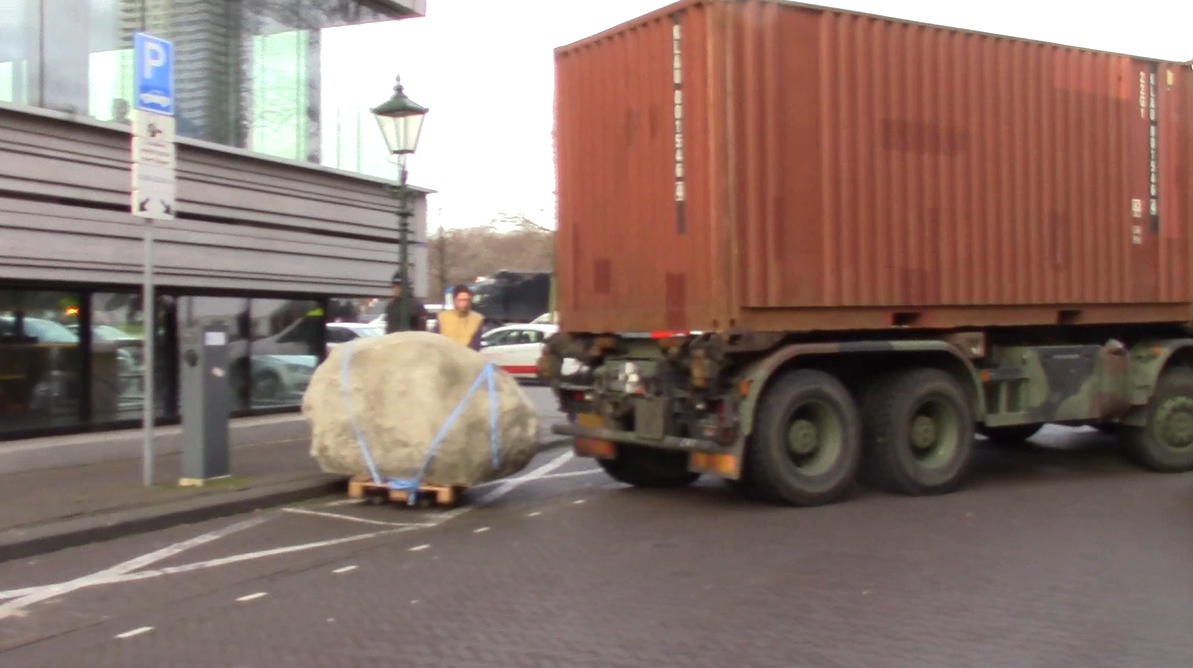 screenshot of video documentation of the tranportation of the rock